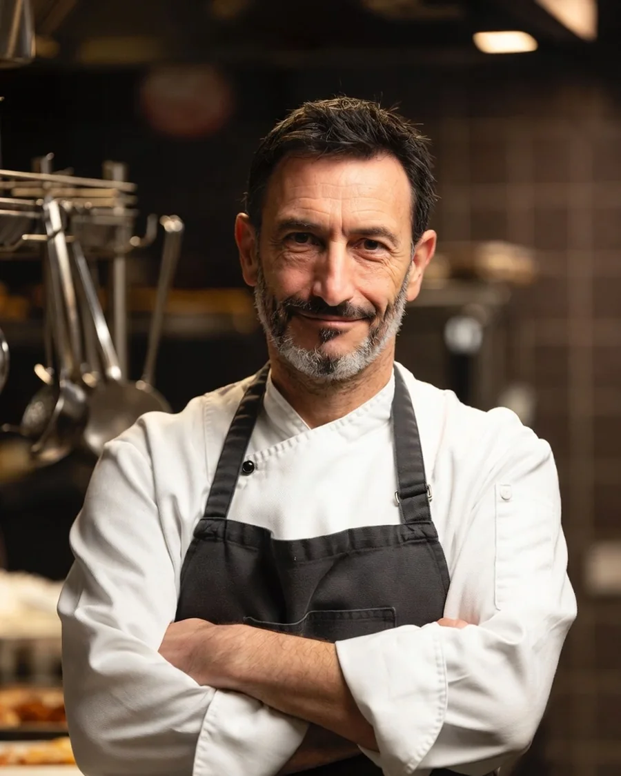 Head chef Luca Moretti in the kitchen of the Osteria